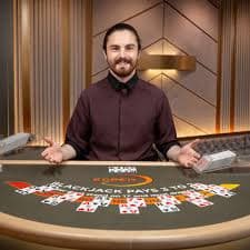 HD multi-camera live-dealer studio with professional dealers at blackjack table
